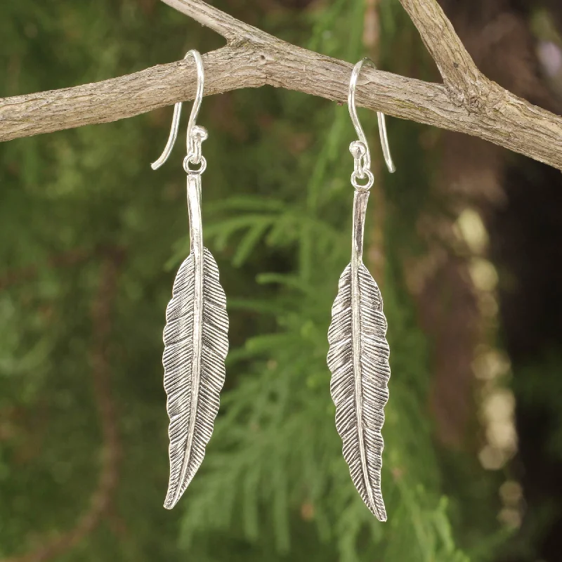 Best hoop earrings with tribal designs for a cultural and exotic aesthetic-Flight Sterling Silver Feather Motif Earrings