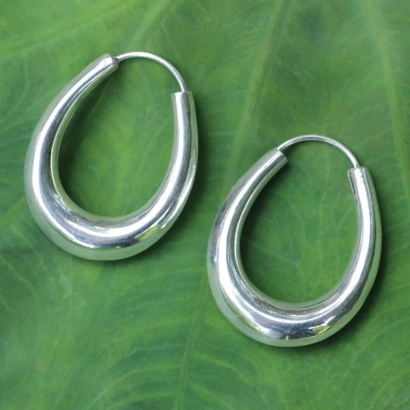 Hoop earrings with spiral designs for a dynamic and fluid look-Modern Treasure Sterling Silver Hoop Earrings