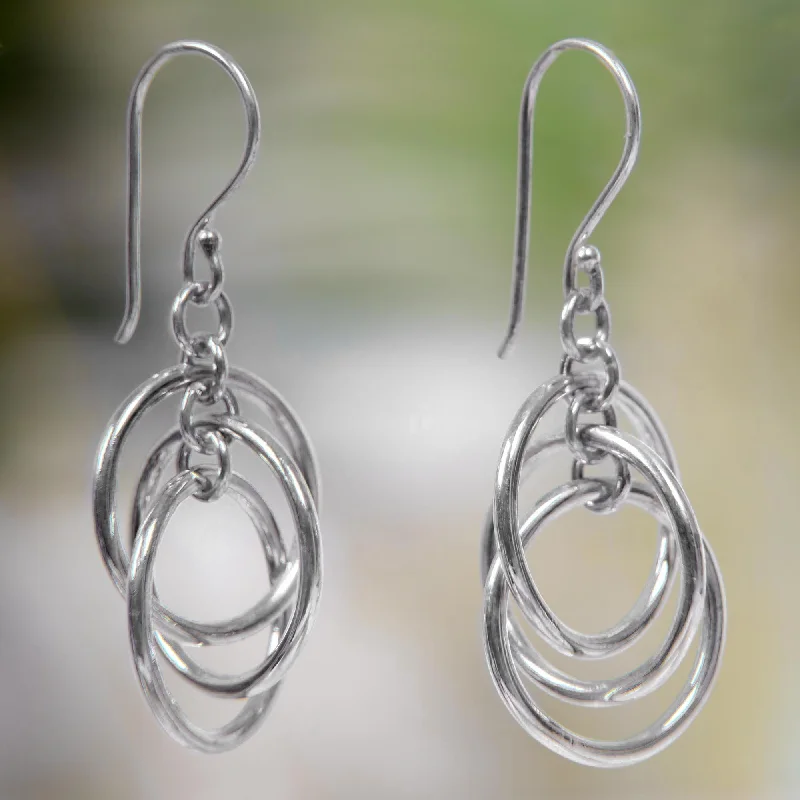 Best hoop earrings with vintage coins for a retro, antique-inspired style-Ring Ring 3 Ring Sterling Silver Earrings