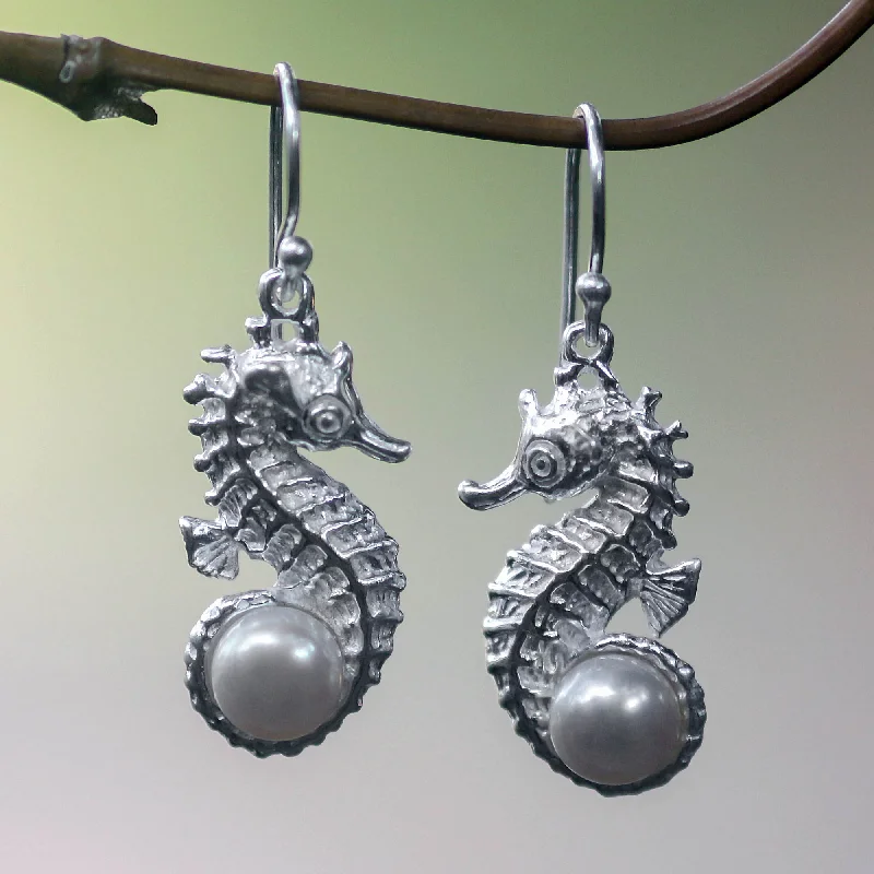 Classic hoop earrings with a thin profile for a sleek and subtle style-Sea Horse Treasure Earrings