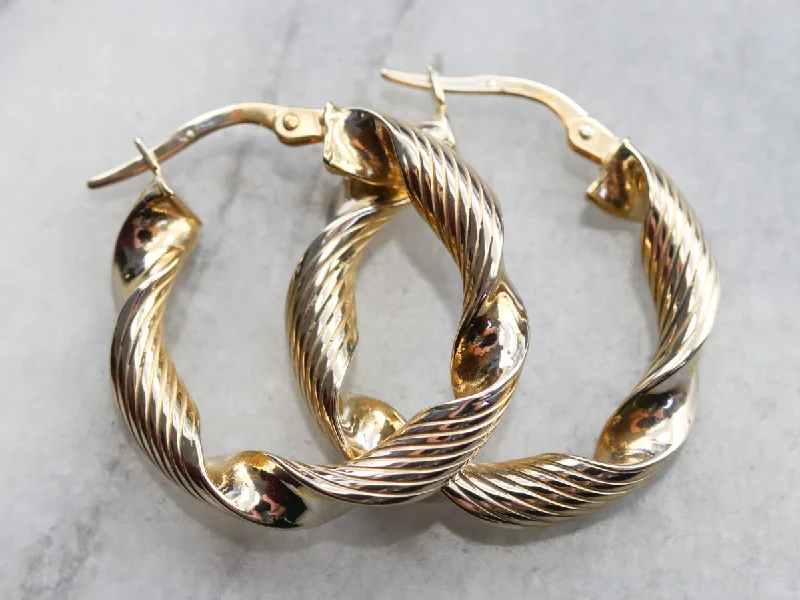 Hoop earrings with hearts for a sweet and romantic gesture-Twisted Gold Ribbon Hoop Earrings