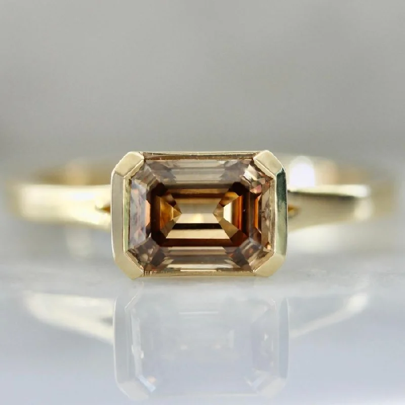 Engagement rings with mixed metal ruby bands -Amaretto Champagne East West Emerald Cut Diamond Ring