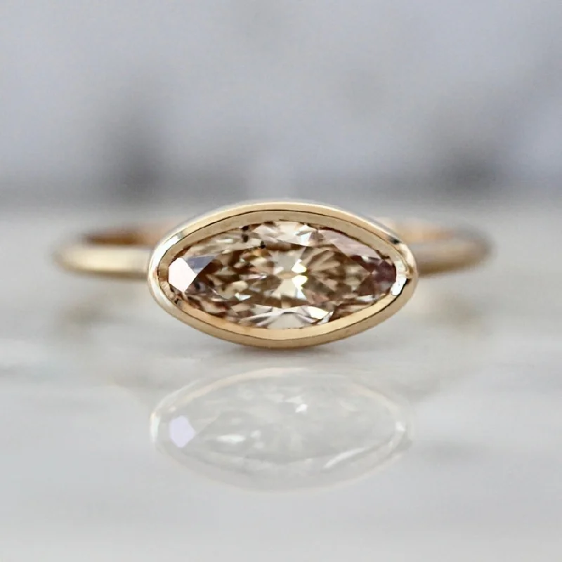 Engagement rings with vintage rose quartz settings -Cookie Dough Champagne Moval Cut Diamond Ring