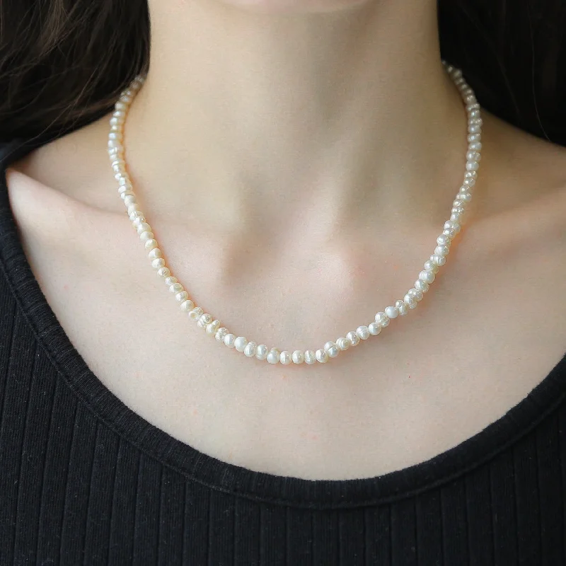 Stylish necklaces and pendants with diamonds for a glamorous and elegant look-Capri GOLD Necklace Dainty Rice Baroque Freshwater Pearl Choker Necklace